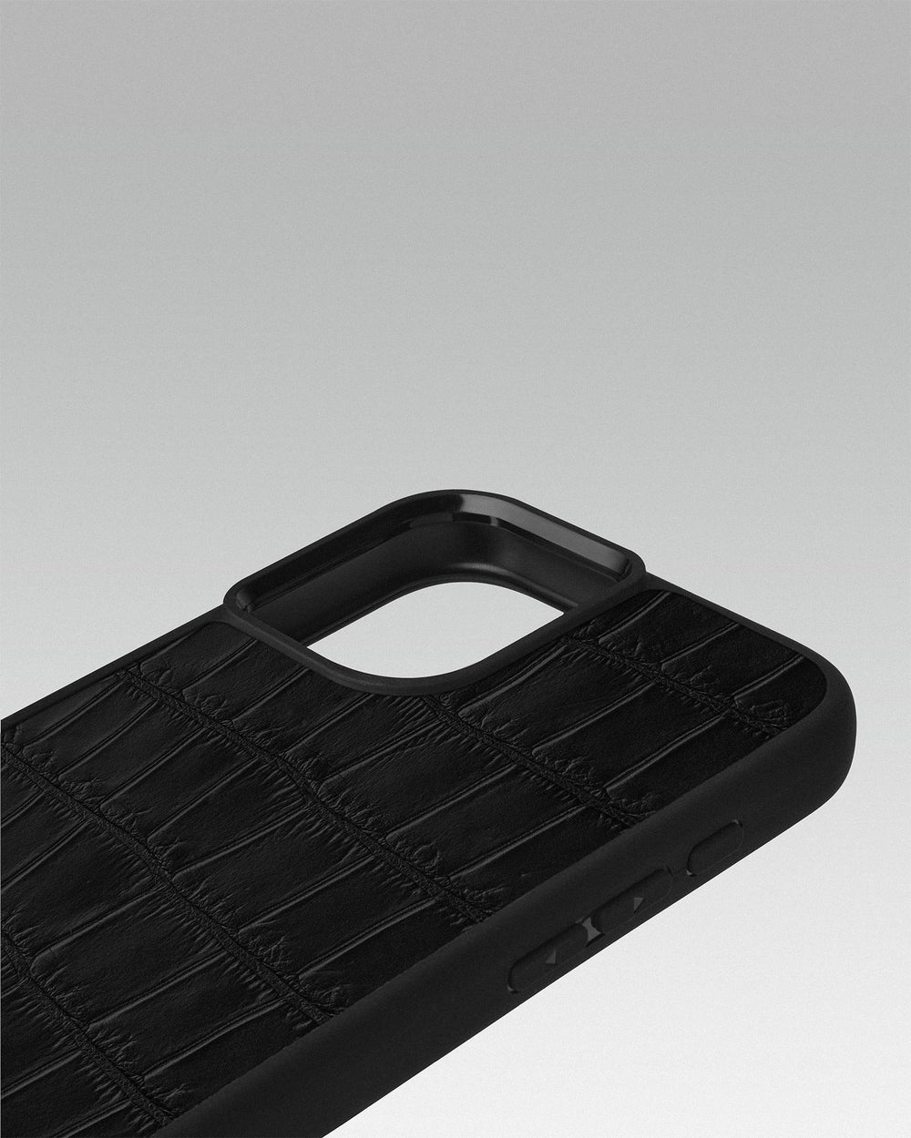 Etui z czarnej skóry krokodyla na iPhone 16 Plus