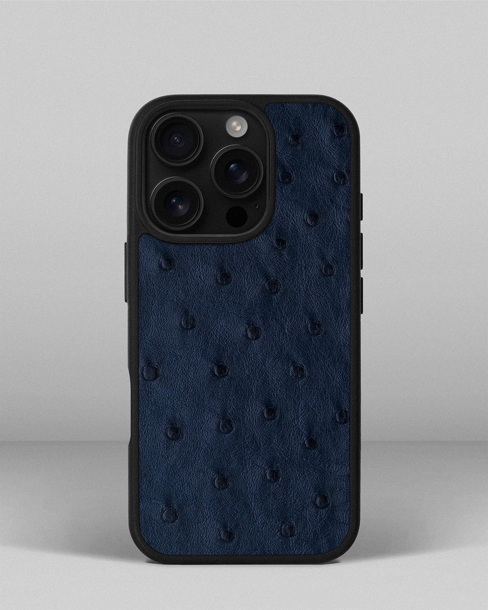 Etui z ciemnoniebieskiej skóry strusia z pęcherzykami do iPhone 16 Pro