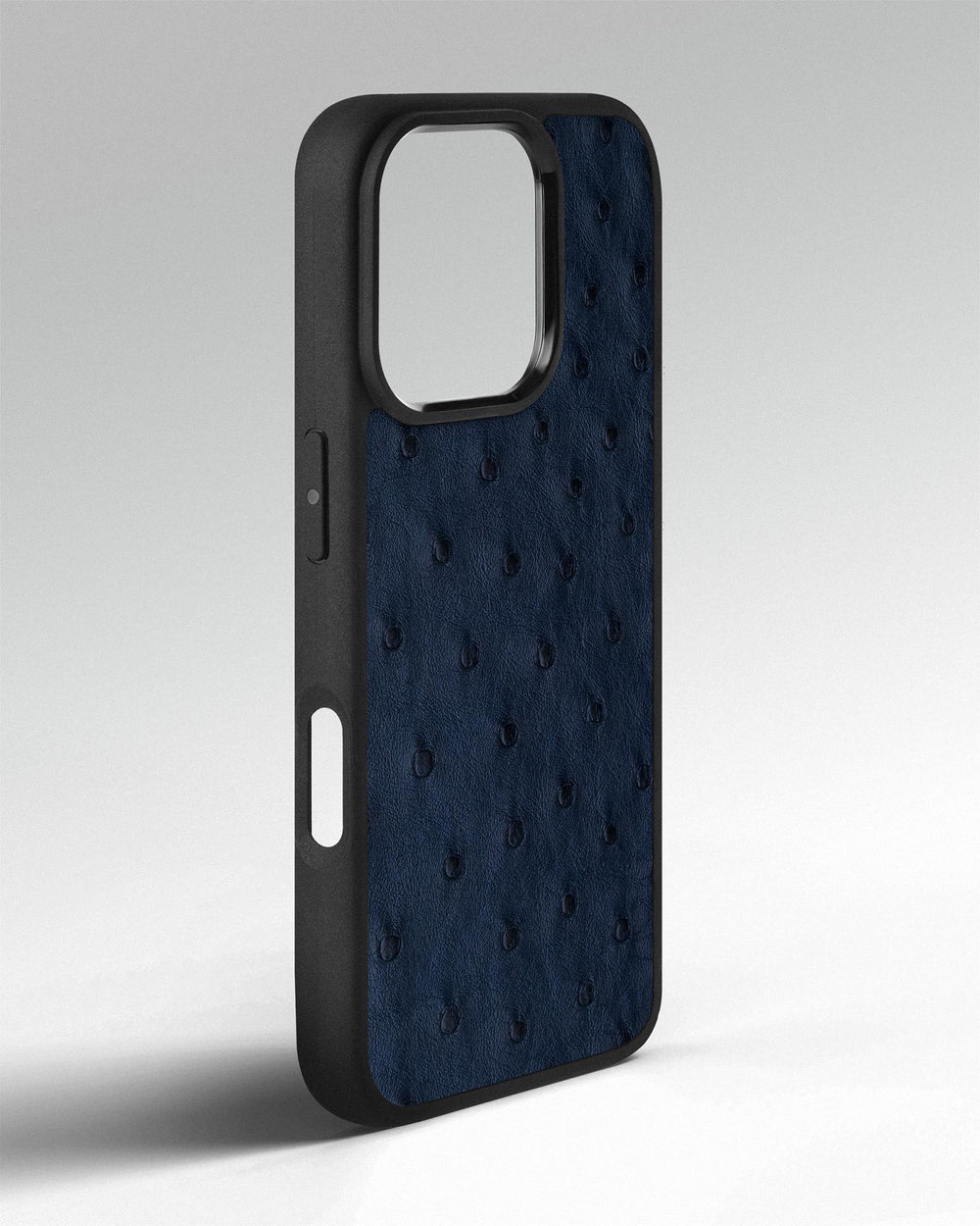 Etui z ciemnoniebieskiej skóry strusia z pęcherzykami do iPhone 16 Pro
