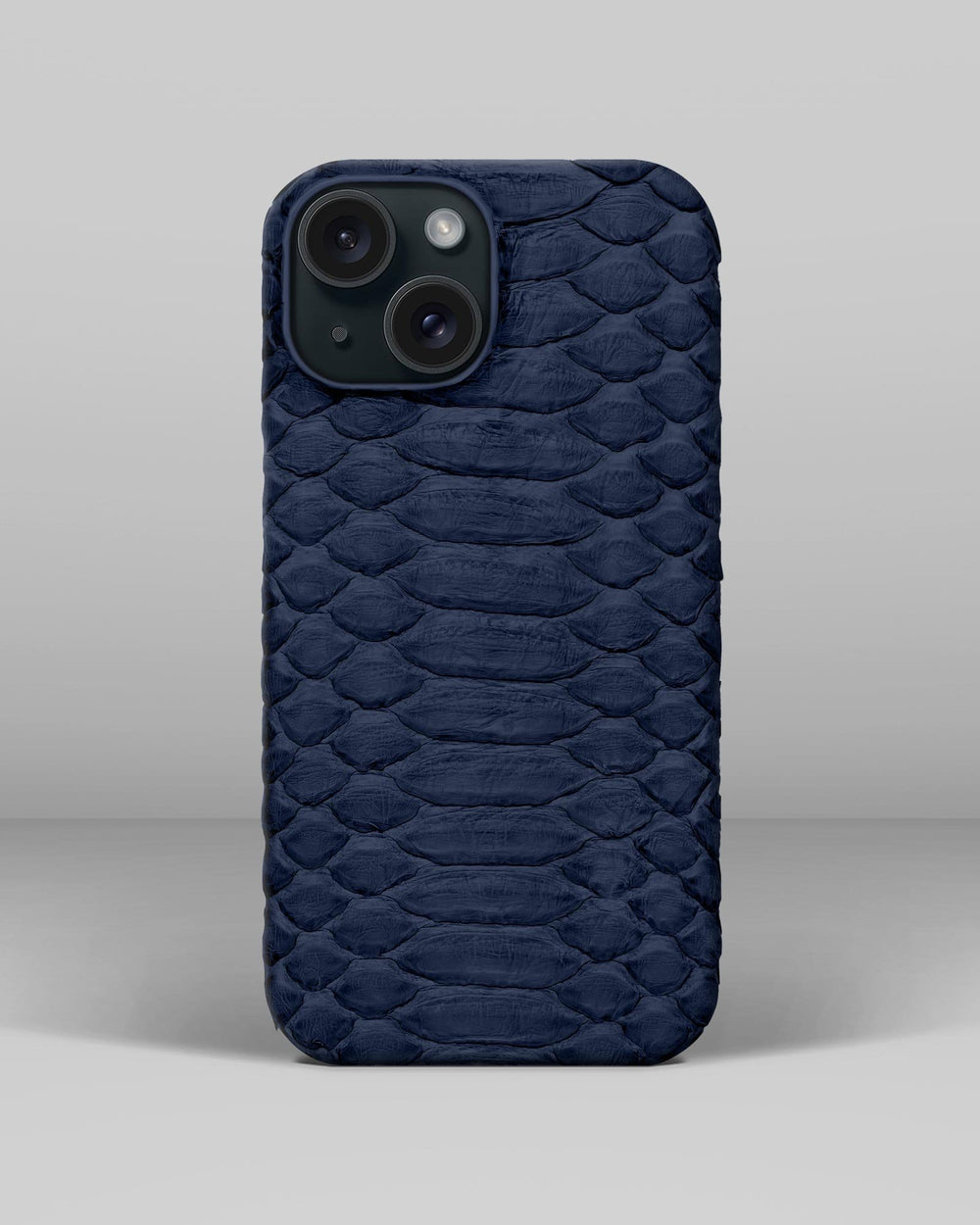 Skórzane etui z ciemnoniebieskiego pytona do iPhone 16