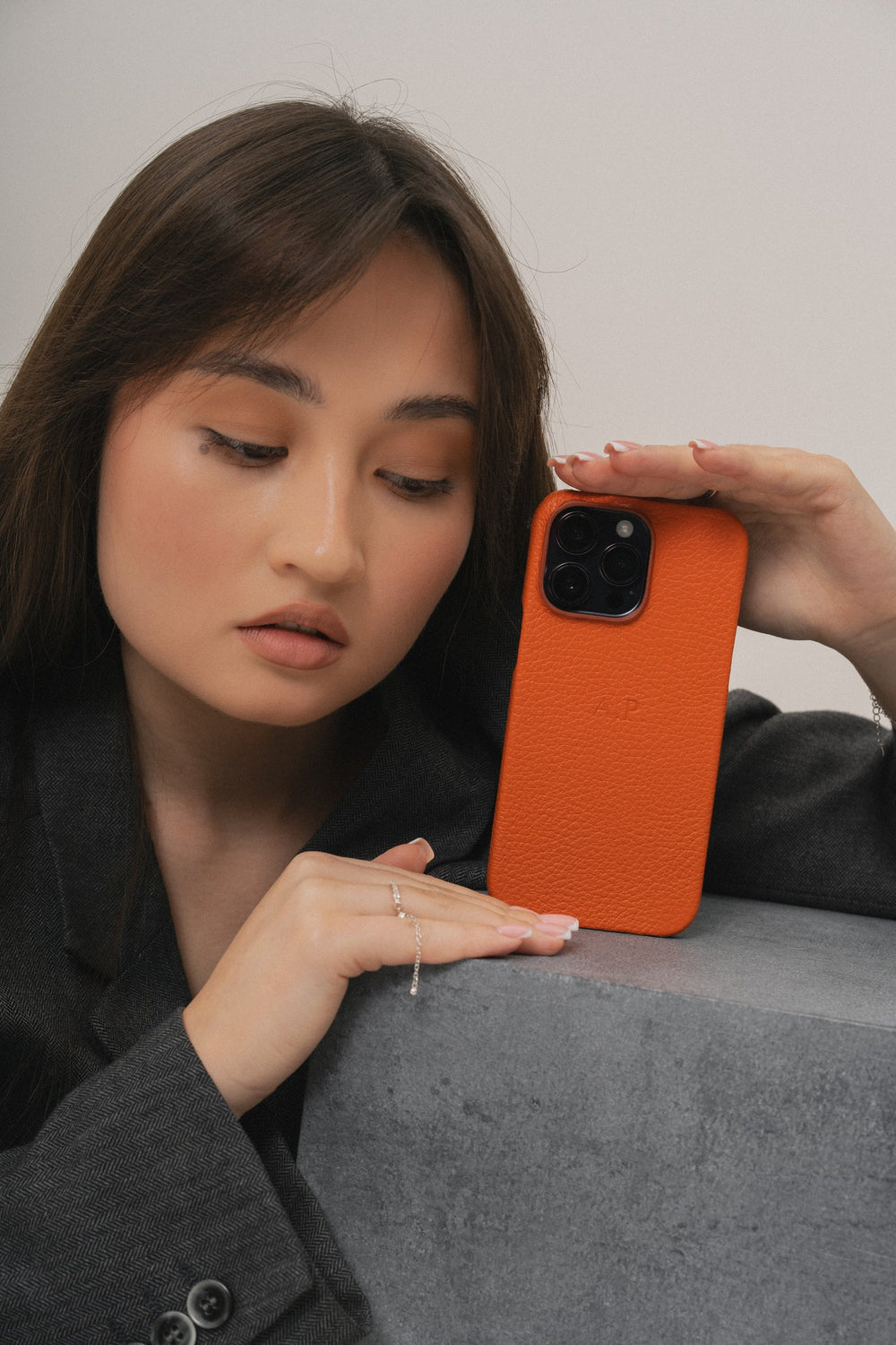 Pomarańczowy skórzany etui do iPhone 14 Pro Max