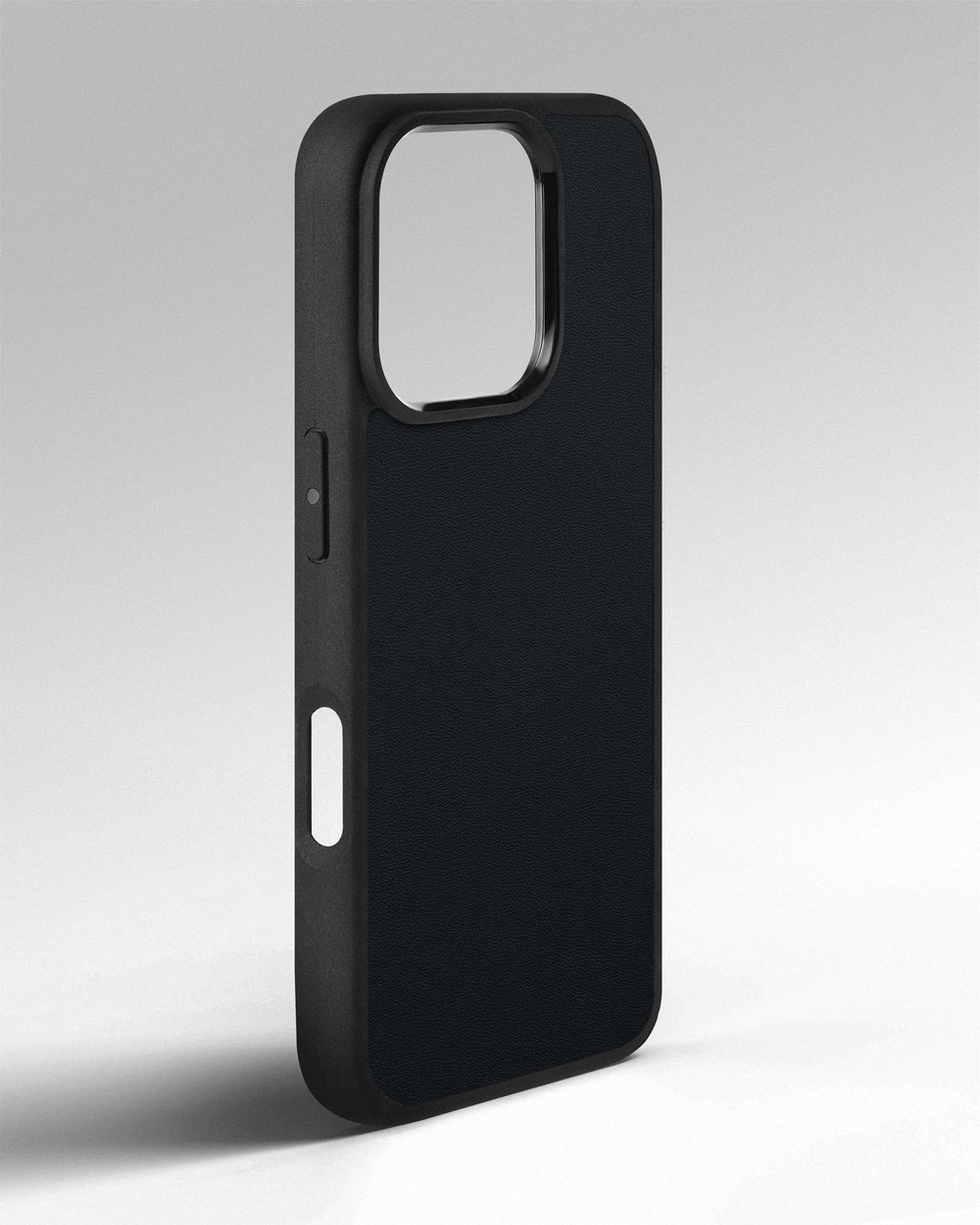 Etui na iPhone 14 Pro ze skóry kuponowej w ciemnoniebieskim kolorze z tłoczeniem Róża Wiatrów