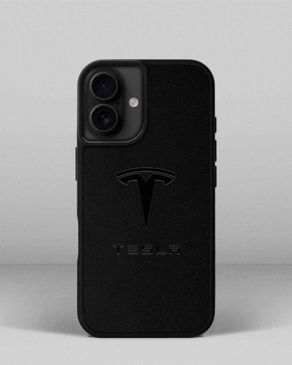 Чохол для iPhone 14 із шкіри купон в чорному кольорі з логотипом Tesla